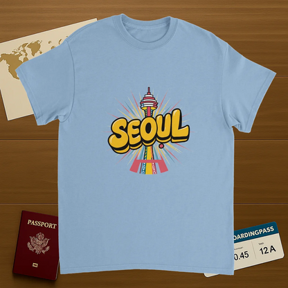 light blue Seoul South Korea Unisex Travel T-Shirt on wooden background with world map, passport, and boarding pass