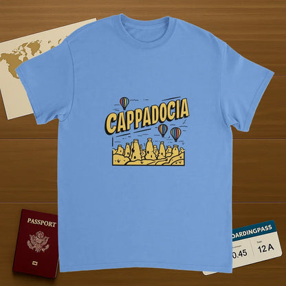 carolina blue Cappadocia Turkey Unisex Travel T-Shirt on wooden background with world map, passport, and boarding pass