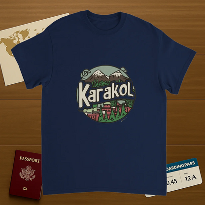 navy Karakol Kyrgyzstan Unisex Travel T-Shirt on wooden background with world map, passport, and boarding pass