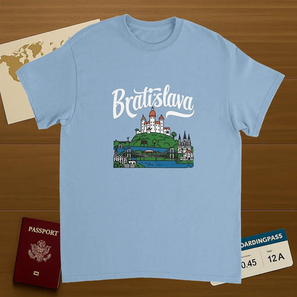 light blue Bratislava Slovakia Unisex Travel T-Shirt on wooden background with world map, passport, and boarding pass