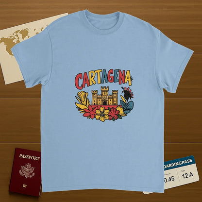 light blue Cartagena Colombia Unisex Travel T-Shirt on wooden background with world map, passport, and boarding pass
